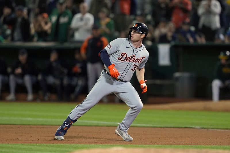 Sep 6, 2024; Oakland, California, USA; Detroit Tigers second baseman Colt Keith (33) after hitting an RBI-single against the Oakland Athletics during the tenth inning at Oakland-Alameda County Coliseum. Mandatory Credit: Darren Yamashita-Imagn Images