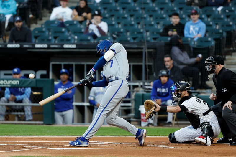 Sep 13, 2023; Chicago, Illinois, USA; Kansas City Royals shortstop Bobby Witt Jr. (7) singles against the Chicago White Sox during the first inning at Guaranteed Rate Field. Mandatory Credit: Kamil Krzaczynski-USA TODAY Sports