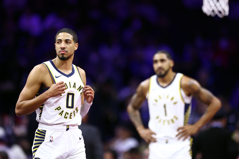 PHILADELPHIA, PENNSYLVANIA - NOVEMBER 14: Tyrese Haliburton #0 of the Indiana Pacers looks on during the first quarter against the Philadelphia 76ers at the Wells Fargo Center on November 14, 2023 in Philadelphia, Pennsylvania. NOTE TO USER: User expressly acknowledges and agrees that, by downloading and or using this photograph, User is consenting to the terms and conditions of the Getty Images License Agreement. (Photo by Tim Nwachukwu/Getty Images)