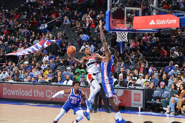 PHILADELPHIA, PA - DECEMBER 11: Jared Butler #4 of the Washington Wizards drives to the basket during the game against the Philadelphia 76ers on December 11, 2023 at the Wells Fargo Center in Philadelphia, Pennsylvania NOTE TO USER: User expressly acknowledges and agrees that, by downloading and/or using this Photograph, user is consenting to the terms and conditions of the Getty Images License Agreement. Mandatory Copyright Notice: Copyright 2023 NBAE (Photo by Jesse D. Garrabrant/NBAE via Getty Images)