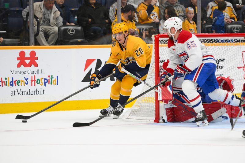 Apr 6, 2025; Nashville, Tennessee, USA; Nashville Predators defenseman Justin Barron (20) skates behind the net against the Montreal Canadiens during the second period at Bridgestone Arena. Mandatory Credit: Steve Roberts-Imagn Images
