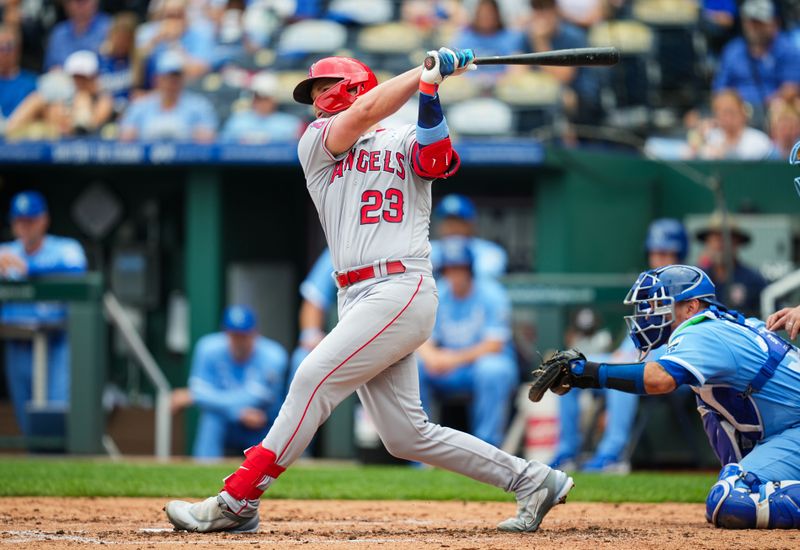 Jun 18, 2023; Kansas City, Missouri, USA; Los Angeles Angels first baseman Brandon Drury (23) hits an RBI single during the second inning against the Kansas City Royals at Kauffman Stadium. Mandatory Credit: Jay Biggerstaff-USA TODAY Sports