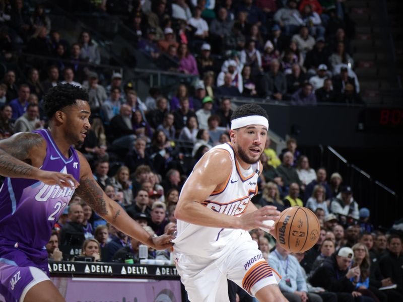 SALT LAKE CITY, UT - DECEMBER 13:   Devin Booker #1 of the Phoenix Suns dribbles the ball during the game against the Utah Jazz during a regular season game on December 13, 2024 at Delta Center in Salt Lake City, Utah. NOTE TO USER: User expressly acknowledges and agrees that, by downloading and or using this Photograph, User is consenting to the terms and conditions of the Getty Images License Agreement. Mandatory Copyright Notice: Copyright 2024 NBAE (Photo by Melissa Majchrzak/NBAE via Getty Images)