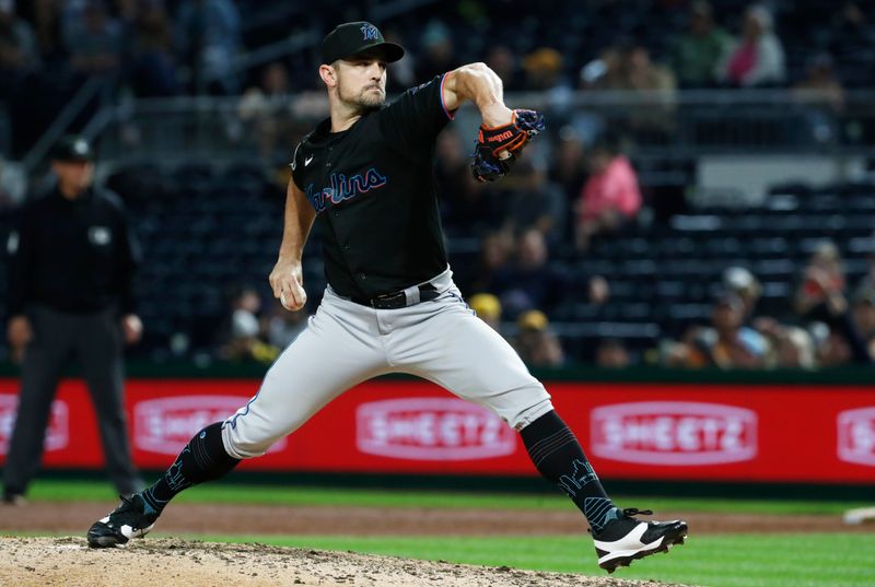 Sep 29, 2023; Pittsburgh, Pennsylvania, USA;  Miami Marlins relief pitcher David Robertson (19) pitches against the Pittsburgh Pirates during the eighth inning at PNC Park. Miami won 4-3. Mandatory Credit: Charles LeClaire-USA TODAY Sports