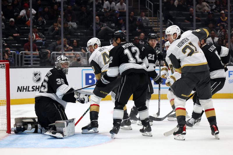 Oct 30, 2024; Los Angeles, California, USA; Los Angeles Kings goaltender Darcy Kuemper (35) gives up a goal to Vegas Golden Knights left wing Pavel Dorofeyev (16) during the third period at Crypto.com Arena. Mandatory Credit: Kiyoshi Mio-Imagn Images