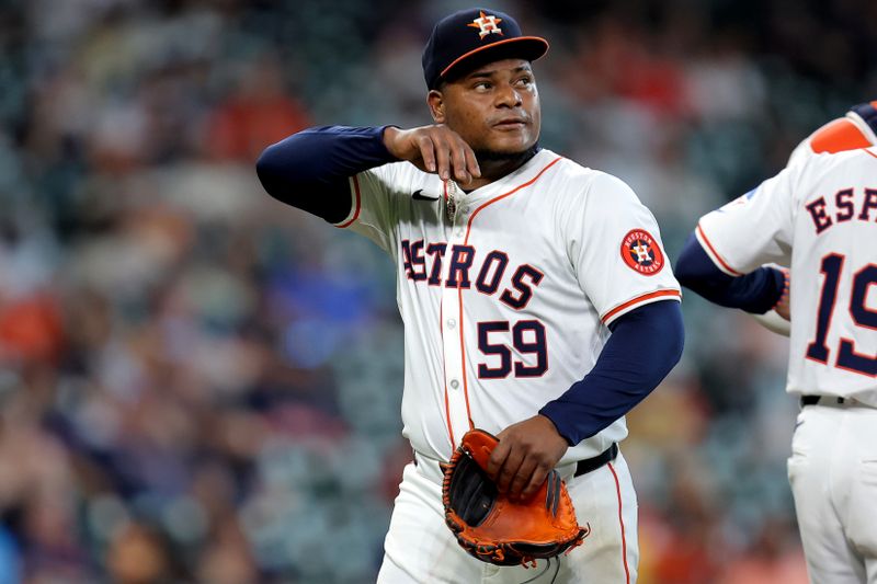 Sep 12, 2024; Houston, Texas, USA; Houston Astros starting pitcher Framber Valdez (59) reacts after being relieved from the game against the Houston Astros during the seventh inning at Minute Maid Park. Mandatory Credit: Erik Williams-Imagn Images