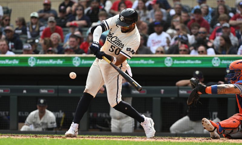 Sep 10, 2023; Minneapolis, Minnesota, USA; Minnesota Twins left fielder Willi Castro (50) gets a base hit in the sixth inning against the New York Mets at Target Field. Mandatory Credit: Michael McLoone-USA TODAY Sports