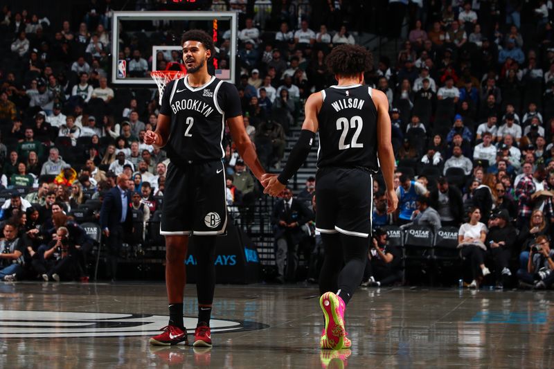 BROOKLYN, NY - OCTOBER 27:  Cameron Johnson #2 and Jalen Wilson #22 of the Brooklyn Nets high five during the game against the Milwaukee Bucks on October 27, 2024 at Barclays Center in Brooklyn, New York. NOTE TO USER: User expressly acknowledges and agrees that, by downloading and or using this Photograph, user is consenting to the terms and conditions of the Getty Images License Agreement. Mandatory Copyright Notice: Copyright 2024 NBAE (Photo by David L. Nemec/NBAE via Getty Images)