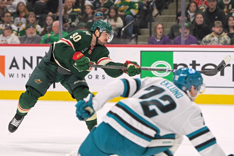 Apr 9, 2025; Saint Paul, Minnesota, USA;  Minnesota Wild forward Marcus Johansson (90) scores a goal against the San Jose Sharks during the first period at Xcel Energy Center. Mandatory Credit: Nick Wosika-Imagn Images
