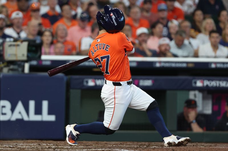 Oct 2, 2024; Houston, Texas, USA;Houston Astros second base Jose Altuve (27) nearly loses his helmet on a swing against the Detroit Tigers during the third inning of game two of the Wildcard round for the 2024 MLB Playoffs at Minute Maid Park. Mandatory Credit: Thomas Shea-Imagn Images