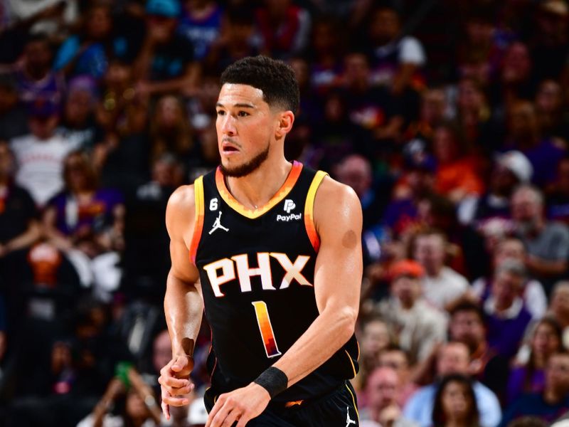 PHOENIX, AZ - APRIL 16:  Devin Booker #1 of the Phoenix Suns goes to the basket during the game During round one game one of the 2023 NBA Playoffs on April 16, 2023 at Footprint Center in Phoenix, Arizona. NOTE TO USER: User expressly acknowledges and agrees that, by downloading and or using this photograph, user is consenting to the terms and conditions of the Getty Images License Agreement. Mandatory Copyright Notice: Copyright 2023 NBAE (Photo by Barry Gossage/NBAE via Getty Images)