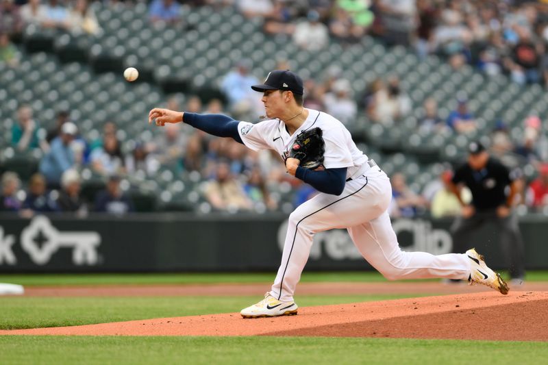 Jun 27, 2023; Seattle, Washington, USA; Seattle Mariners starting pitcher Bryan Woo (33) pitches to the Washington Nationals during the first inning at T-Mobile Park. Mandatory Credit: Steven Bisig-USA TODAY Sports