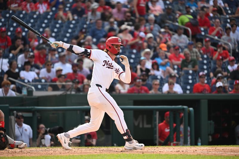 Jul 8, 2024; Washington, District of Columbia, USA; Washington Nationals left fielder Jesse Winker (6) watches the ball after hitting it into play against the St. Louis Cardinals during the fourth inning at Nationals Park. Mandatory Credit: Rafael Suanes-USA TODAY Sports