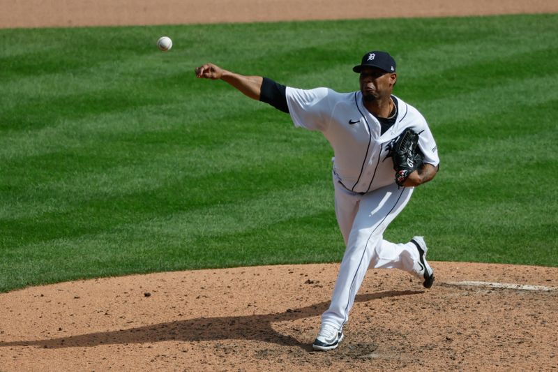 Sep 14, 2023; Detroit, Michigan, USA; Detroit Tigers relief pitcher Jose Cisnero (67) pitches in the ninth inning against the Cincinnati Reds at Comerica Park. Mandatory Credit: Rick Osentoski-USA TODAY Sports