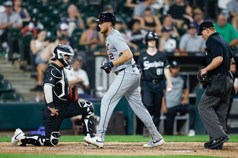 Aug 26, 2024; Chicago, Illinois, USA; Detroit Tigers outfielder Parker Meadows (22) crosses home plate after hitting a solo home run against the Chicago White Sox during the seventh inning at Guaranteed Rate Field. Mandatory Credit: Kamil Krzaczynski-USA TODAY Sports