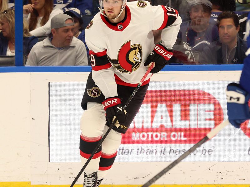 Apr 11, 2024; Tampa, Florida, USA; Ottawa Senators right wing Drake Batherson (19) skates with the puck against the Tampa Bay Lightning during the second period at Amalie Arena. Mandatory Credit: Kim Klement Neitzel-USA TODAY Sports