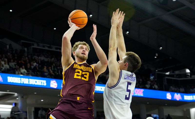 Mar 9, 2024; Evanston, Illinois, USA; Northwestern Wildcats guard Ryan Langborg (5) defends Minnesota Golden Gophers forward Parker Fox (23) during the first half at Welsh-Ryan Arena. Mandatory Credit: David Banks-USA TODAY Sports