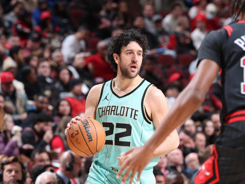 CHICAGO, IL - DECEMBER 13: Vasilije Micic #22 of the Charlotte Hornets  dribbles the ball during the game against the Chicago Bulls on December 13, 2024 at United Center in Chicago, Illinois. NOTE TO USER: User expressly acknowledges and agrees that, by downloading and or using this photograph, User is consenting to the terms and conditions of the Getty Images License Agreement. Mandatory Copyright Notice: Copyright 2024 NBAE (Photo by Jeff Haynes/NBAE via Getty Images)