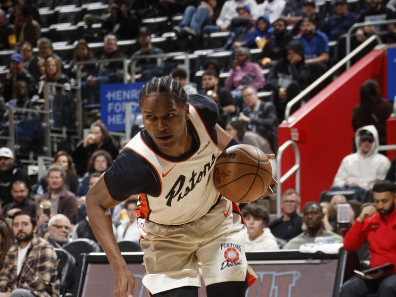 DETROIT, MI - NOVEMBER 25:  Ausar Thompson #9 of the Detroit Pistons drives to the basket during the game against the Toronto Raptors on November 25, 2024 at Little Caesars Arena in Detroit, Michigan. NOTE TO USER: User expressly acknowledges and agrees that, by downloading and/or using this photograph, User is consenting to the terms and conditions of the Getty Images License Agreement. Mandatory Copyright Notice: Copyright 2024 NBAE (Photo by Brian Sevald/NBAE via Getty Images)