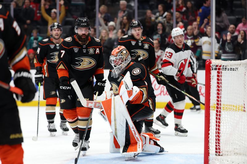 Mar 1, 2024; Anaheim, California, USA; Anaheim Ducks goaltender Lukas Dostal (1) celebrates a win against the New Jersey Devils at end of the the third period at Honda Center. Mandatory Credit: Kiyoshi Mio-USA TODAY Sports