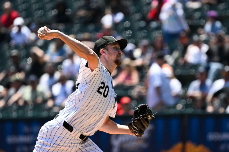 Jul 10, 2024; Chicago, Illinois, USA;  Chicago White Sox pitcher Erick Fedde (20) delivers during the first inning against the Minnesota Twins at Guaranteed Rate Field. Mandatory Credit: Matt Marton-USA TODAY Sports