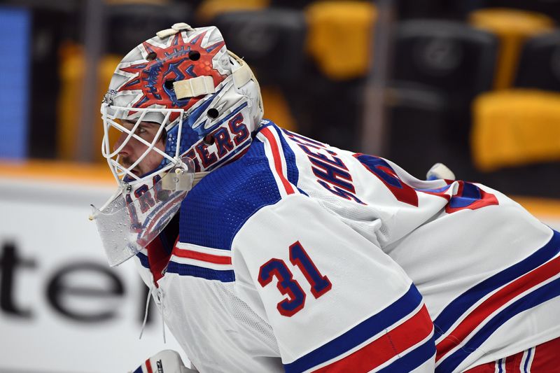 Dec 2, 2023; Nashville, Tennessee, USA; New York Rangers goaltender Igor Shesterkin (31) in net during the first period against the Nashville Predators at Bridgestone Arena. Mandatory Credit: Christopher Hanewinckel-USA TODAY Sports