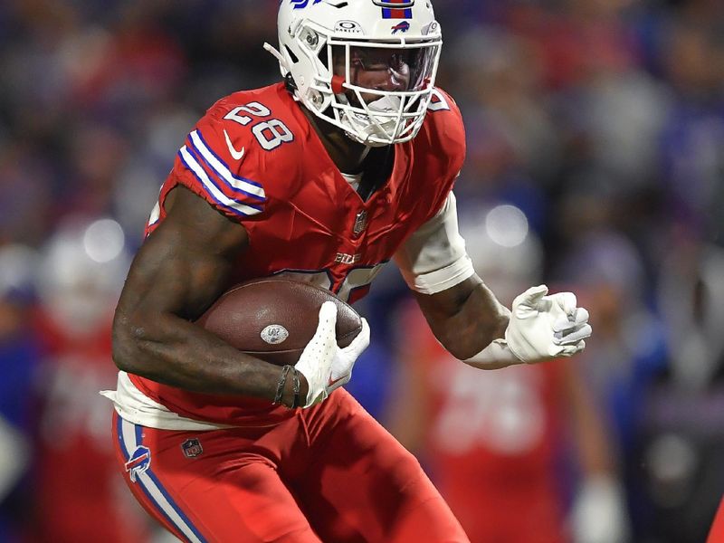 Buffalo Bills running back Latavius Murray (28) runs with the ball during the second half of an NFL football game against the New York Giants in Orchard Park, N.Y., Sunday, Oct. 15, 2023. (AP Photo/Adrian Kraus)