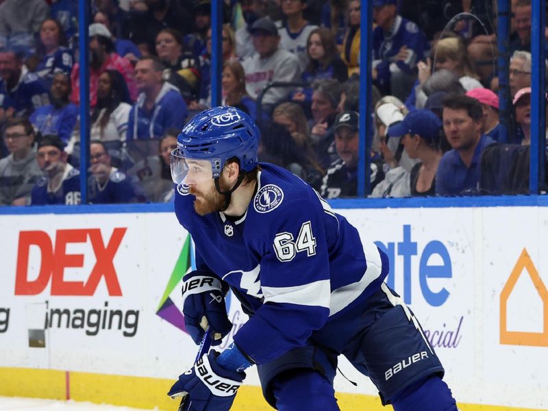 Jan 27, 2024; Tampa, Florida, USA; Tampa Bay Lightning center Tyler Motte (64) skates with the puck against the New Jersey Devils during the second period at Amalie Arena. Mandatory Credit: Kim Klement Neitzel-USA TODAY Sports