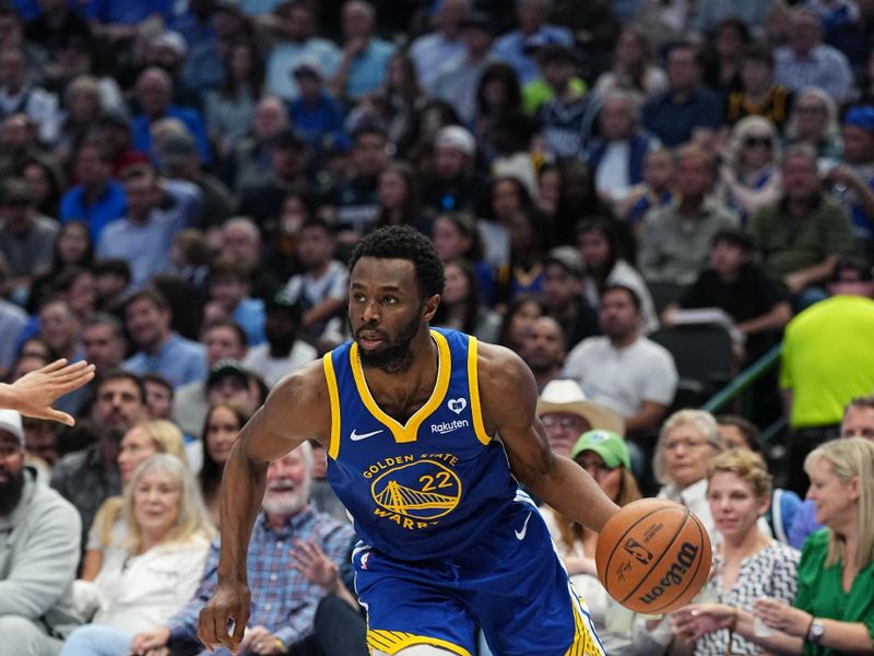 DALLAS, TX - MARCH 13: Andrew Wiggins #22 of the Golden State Warriors drives to the basket during the game against the Dallas Mavericks on March 13, 2024 at the American Airlines Center in Dallas, Texas. NOTE TO USER: User expressly acknowledges and agrees that, by downloading and or using this photograph, User is consenting to the terms and conditions of the Getty Images License Agreement. Mandatory Copyright Notice: Copyright 2024 NBAE (Photo by Glenn James/NBAE via Getty Images)