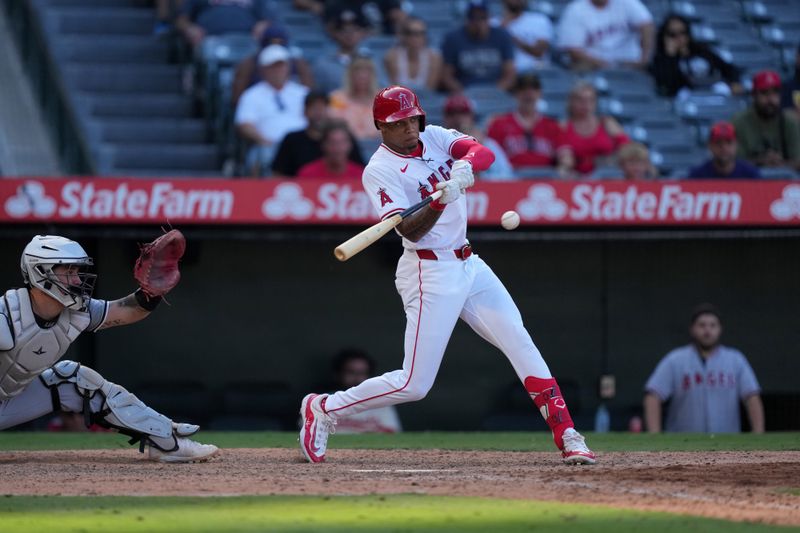 Sep 18, 2024; Anaheim, California, USA; Los Angeles Angels center fielder Jordyn Aadams (39) hits a walkoff single in the 13th inning against the Chicago White Sox at Angel Stadium. Mandatory Credit: Kirby Lee-Imagn Images