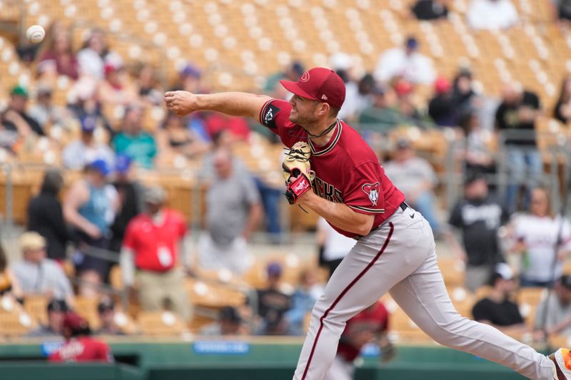 Mar 20, 2023; Phoenix, Arizona, USA; Arizona Diamondbacks pitcher Bryce Jarvis throws against the Chicago White Sox in the first inning at Camelback Ranch-Glendale. Mandatory Credit: Rick Scuteri-USA TODAY Sports