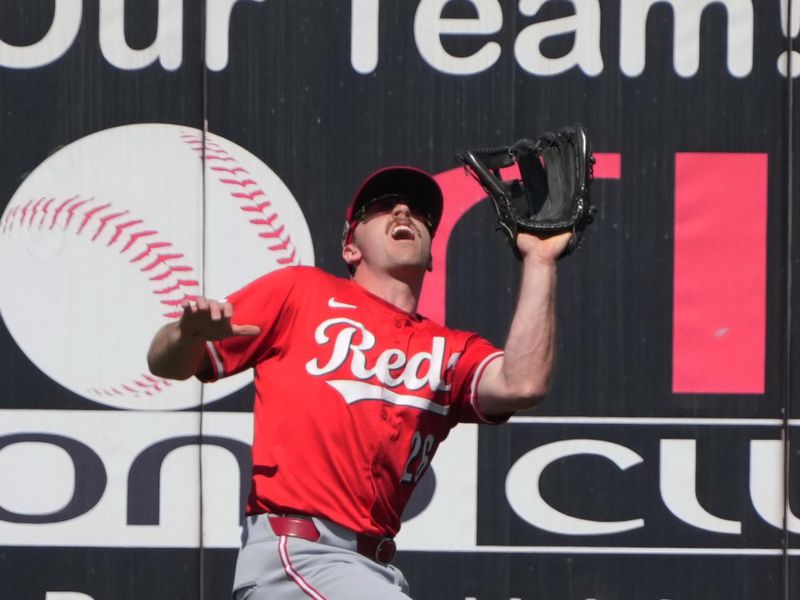 Mar 22, 2025; Peoria, Arizona, USA; Cincinnati Reds outfielder Jacob Hurtubise (26) makes the catch for an out against the San Diego Padres in the third  inning at Peoria Sports Complex. Mandatory Credit: Rick Scuteri-Imagn Images