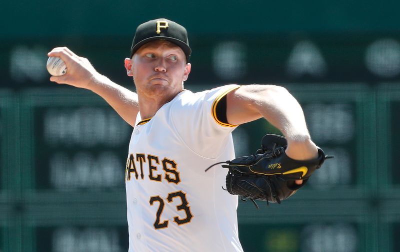 Sep 14, 2024; Pittsburgh, Pennsylvania, USA;  Pittsburgh Pirates starting pitcher Mitch Keller (23) delivers a pitch against the Kansas City Royals during the first inning at PNC Park. Mandatory Credit: Charles LeClaire-Imagn Images