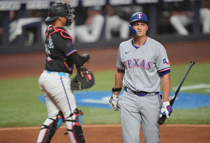 May 31, 2024; Miami, Florida, USA;  Texas Rangers shortstop Corey Seager (5) strikes out in the sixth inning against the Miami Marlins at loanDepot Park. Mandatory Credit: Jim Rassol-USA TODAY Sports