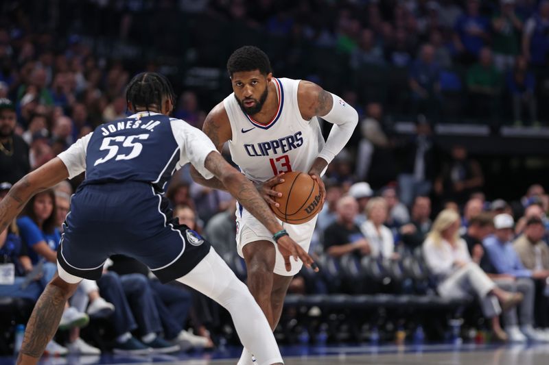 DALLAS, TX - APRIL 28: Paul George #13 of the LA Clippers dribbles the ball during the game against the Dallas Mavericks during Round 1 Game 4 of the 2024 NBA Playoffs on April 28, 2024 at the American Airlines Center in Dallas, Texas. NOTE TO USER: User expressly acknowledges and agrees that, by downloading and or using this photograph, User is consenting to the terms and conditions of the Getty Images License Agreement. Mandatory Copyright Notice: Copyright 2024 NBAE (Photo by Tim Heitman/NBAE via Getty Images)