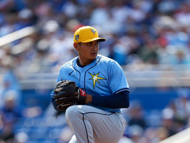 Feb 28, 2024; Dunedin, Florida, USA;  Tampa Bay Rays relief pitcher Manuel Rodriguez (39) throws a pitch against the Toronto Blue Jays in the fifth inning at TD Ballpark. Mandatory Credit: Nathan Ray Seebeck-USA TODAY Sports