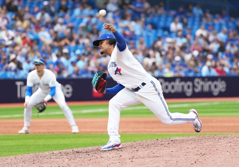 Sep 10, 2023; Toronto, Ontario, CAN; Toronto Blue Jays relief pitcher Genesis Cabrera (92) throws a pitch against the Kansas City Royals during the eighth inning at Rogers Centre. Mandatory Credit: Nick Turchiaro-USA TODAY Sports