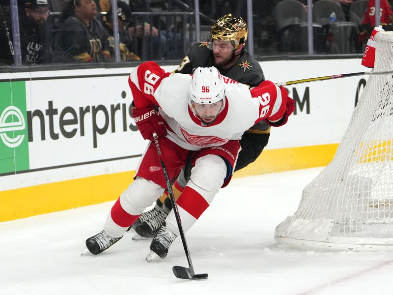 Jan 19, 2023; Las Vegas, Nevada, USA; Detroit Red Wings defenseman Jake Walman (96) skates ahead of Vegas Golden Knights center Paul Cotter (43) during the second period at T-Mobile Arena. Mandatory Credit: Stephen R. Sylvanie-USA TODAY Sports