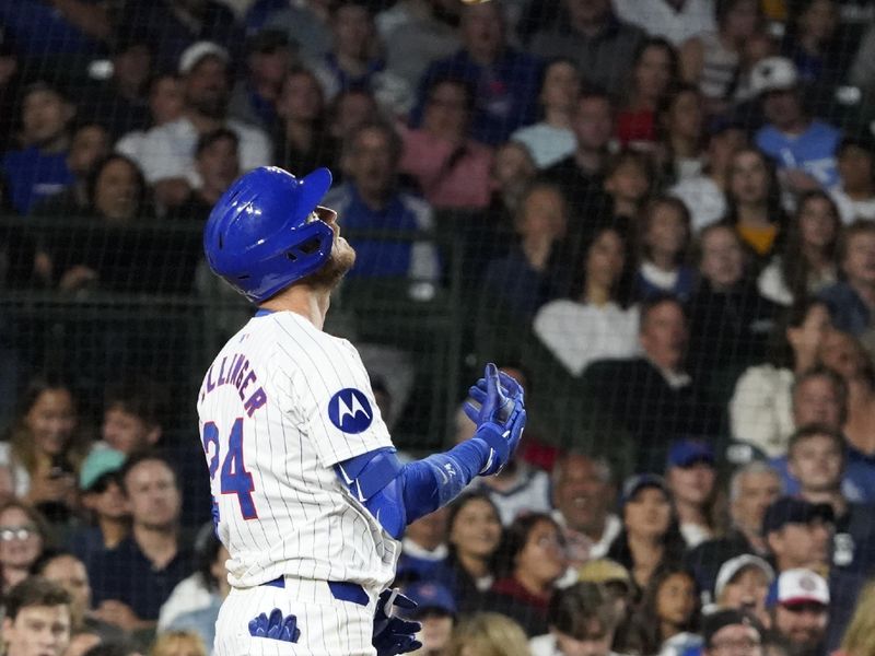 Aug 6, 2024; Chicago, Illinois, USA; Chicago Cubs designated hitter Cody Bellinger (24) reacts after striking out during the fifth inning at Wrigley Field. Mandatory Credit: David Banks-USA TODAY Sports