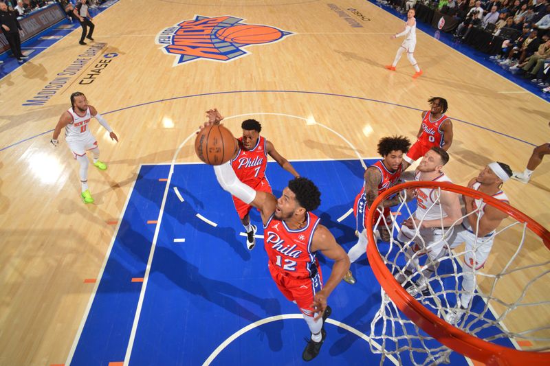 NEW YORK, NY - APRIL 20: Tobias Harris #12 of the Philadelphia 76ers rebounds the ball during the game against the New York Knicks during Round 1 Game 1 of the 2024 NBA Playoffs on April 20, 2024 at Madison Square Garden in New York City, New York.  NOTE TO USER: User expressly acknowledges and agrees that, by downloading and or using this photograph, User is consenting to the terms and conditions of the Getty Images License Agreement. Mandatory Copyright Notice: Copyright 2024 NBAE  (Photo Jesse D. Garrabrant/NBAE via Getty Images)