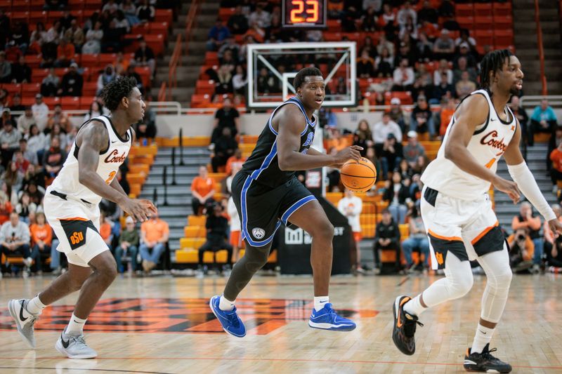 Feb 17, 2024; Stillwater, Oklahoma, USA; Brigham Young Cougars forward Fousseyni Traore (45) brings the ball up court during the second half against the Oklahoma State Cowboys at Gallagher-Iba Arena. Mandatory Credit: William Purnell-USA TODAY Sports