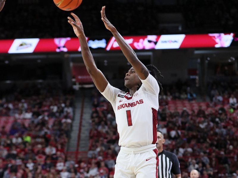 Dec 21, 2023; Fayetteville, Arkansas, USA; Arkansas Razorbacks guard Keyon Menifield Jr (1) shoots a three point shot in the second half against the Abilene Christian Wildcats at Bud Walton Arena. Arkansas won 83-73. Mandatory Credit: Nelson Chenault-USA TODAY Sports