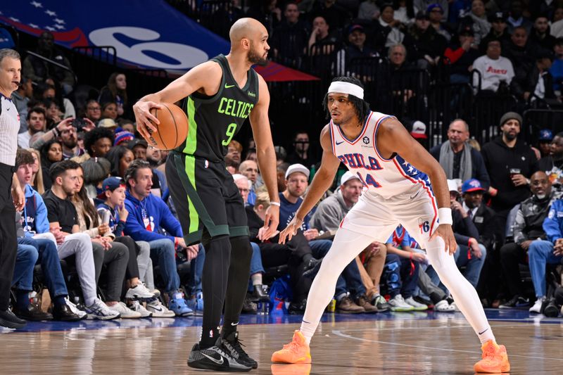 PHILADELPHIA, PA - FEBRUARY 2: Derrick White #9 of the Boston Celtics handles the ball during the game against the Philadelphia 76ers on February 2, 2025 at the Wells Fargo Center in Philadelphia, Pennsylvania NOTE TO USER: User expressly acknowledges and agrees that, by downloading and/or using this Photograph, user is consenting to the terms and conditions of the Getty Images License Agreement. Mandatory Copyright Notice: Copyright 2025 NBAE (Photo by David Dow/NBAE via Getty Images)