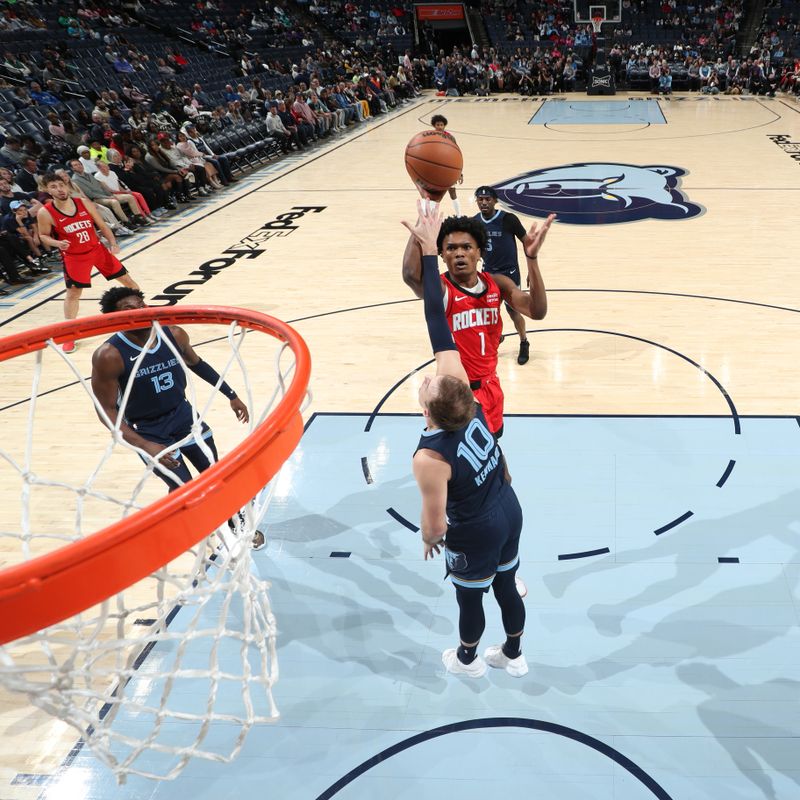 MEMPHIS, TN - FEBRUARY 14: Amen Thompson #1 of the Houston Rockets drives to the basket during the game against the Memphis Grizzlies on February 14, 2024 at FedExForum in Memphis, Tennessee. NOTE TO USER: User expressly acknowledges and agrees that, by downloading and or using this photograph, User is consenting to the terms and conditions of the Getty Images License Agreement. Mandatory Copyright Notice: Copyright 2024 NBAE (Photo by Joe Murphy/NBAE via Getty Images)