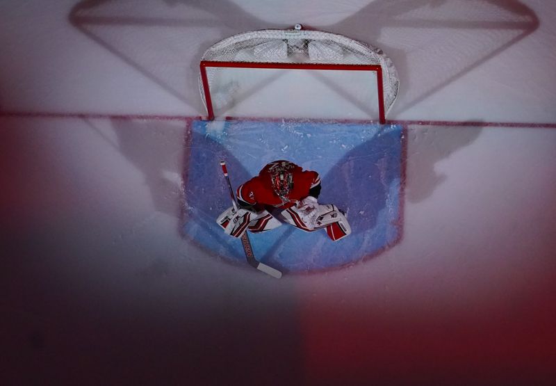 Dec 28, 2023; Raleigh, North Carolina, USA; Carolina Hurricanes goaltender Antti Raanta (32) gets ready for the start of the game against the Montreal Canadiens at PNC Arena. Mandatory Credit: James Guillory-USA TODAY Sports