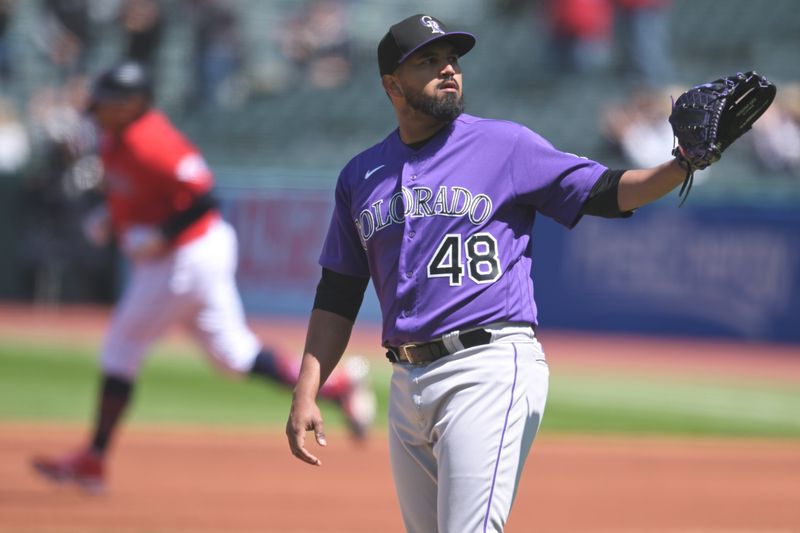 Apr 26, 2023; Cleveland, Ohio, USA; Colorado Rockies starting pitcher German Marquez (48) waits for a new ball as Cleveland Guardians designated hitter Josh Naylor (22) rounds the bases after hitting a home run during the first inning at Progressive Field. Mandatory Credit: Ken Blaze-USA TODAY Sports