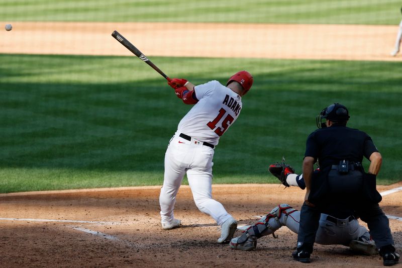 Aug 17, 2023; Washington, District of Columbia, USA; Washington Nationals catcher Riley Adams (15) hits a two run single against the Boston Red Sox during the fifth inning at Nationals Park. Mandatory Credit: Geoff Burke-USA TODAY Sports