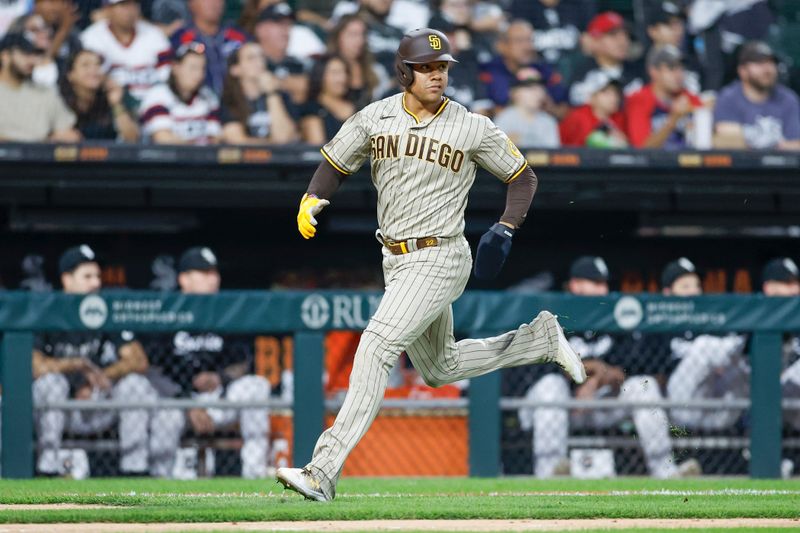 Sep 30, 2023; Chicago, Illinois, USA; San Diego Padres left fielder Juan Soto (22) runs to score against the Chicago White Sox during the second inning at Guaranteed Rate Field. Mandatory Credit: Kamil Krzaczynski-USA TODAY Sports