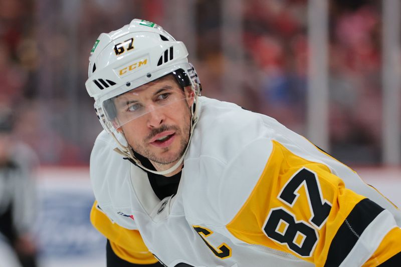 Oct 23, 2025; Sunrise, Florida, USA; Pittsburgh Penguins center Sidney Crosby (87) looks ok against the Florida Panthers during the first period at Amerant Bank Arena. Mandatory Credit: Sam Navarro-Imagn Images