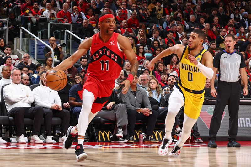 TORONTO, CANADA - FEBRUARY 14: Bruce Brown #11 of the Toronto Raptors dribbles the ball during the game against the Indiana Pacers  on February 14, 2024 at the Scotiabank Arena in Toronto, Ontario, Canada.  NOTE TO USER: User expressly acknowledges and agrees that, by downloading and or using this Photograph, user is consenting to the terms and conditions of the Getty Images License Agreement.  Mandatory Copyright Notice: Copyright 2024 NBAE (Photo by Vaughn Ridley/NBAE via Getty Images)